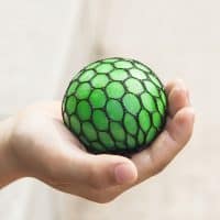 Игрушка антистресс шарик (мячик) лизун в сетке
