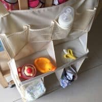 Органайзер-карман на детскую кроватку для хранения памперсов и детских принадлежностей