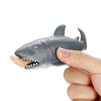 Игрушка-антистресс акула с человеческой ногой